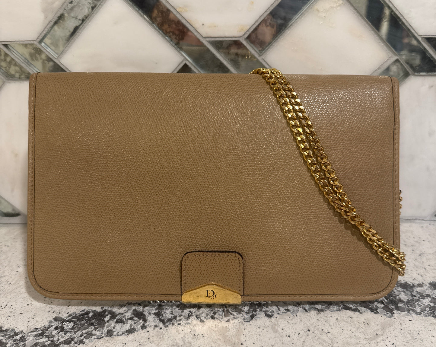 Vintage Christian Dior shoulder bag with gold chain strap.