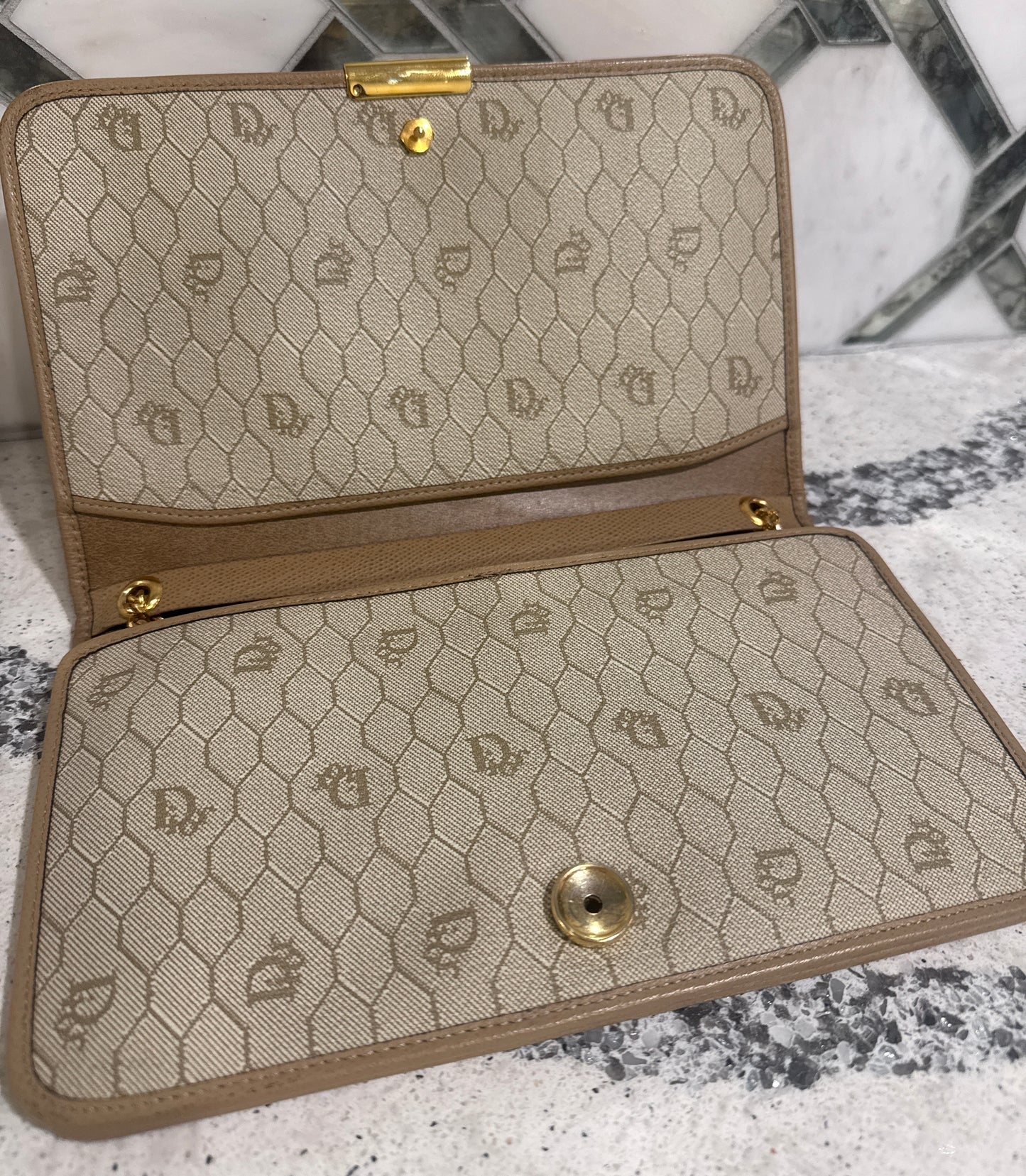 Vintage Christian Dior shoulder bag with gold chain strap.